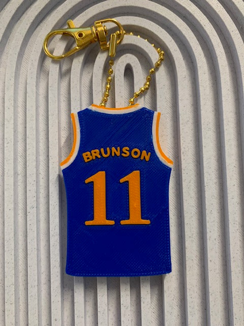 Blue Brunson #11 Knicks-inspired jersey keychain with gold hardware