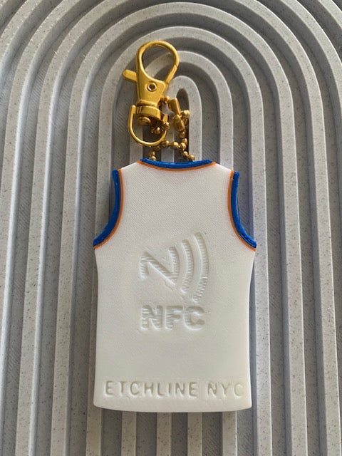 Back of white OG #8 Knicks jersey keychain with NFC symbol and Etchline NYC maker mark